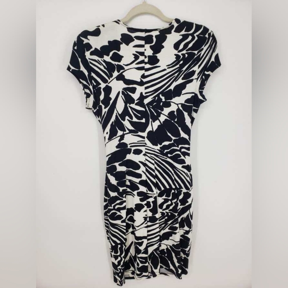 3/$25 Cache Faux Wrap Dress L Abstract Floral Bodycon Sheath Cap Sleeve Black - Picture 2 of 9